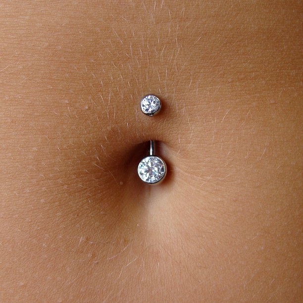 This Navel piercing is healing well and ready for a downsi… Flickr