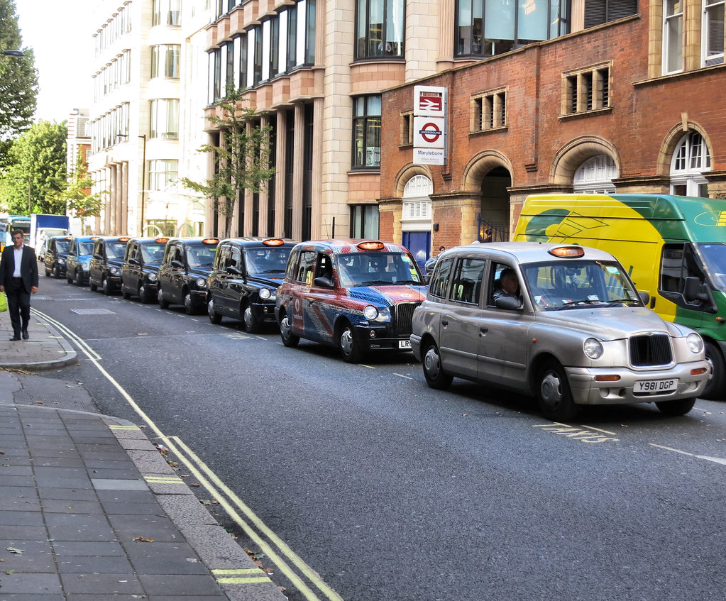 Taxis Queue of taxis waiting their turn to join the rank o… Flickr