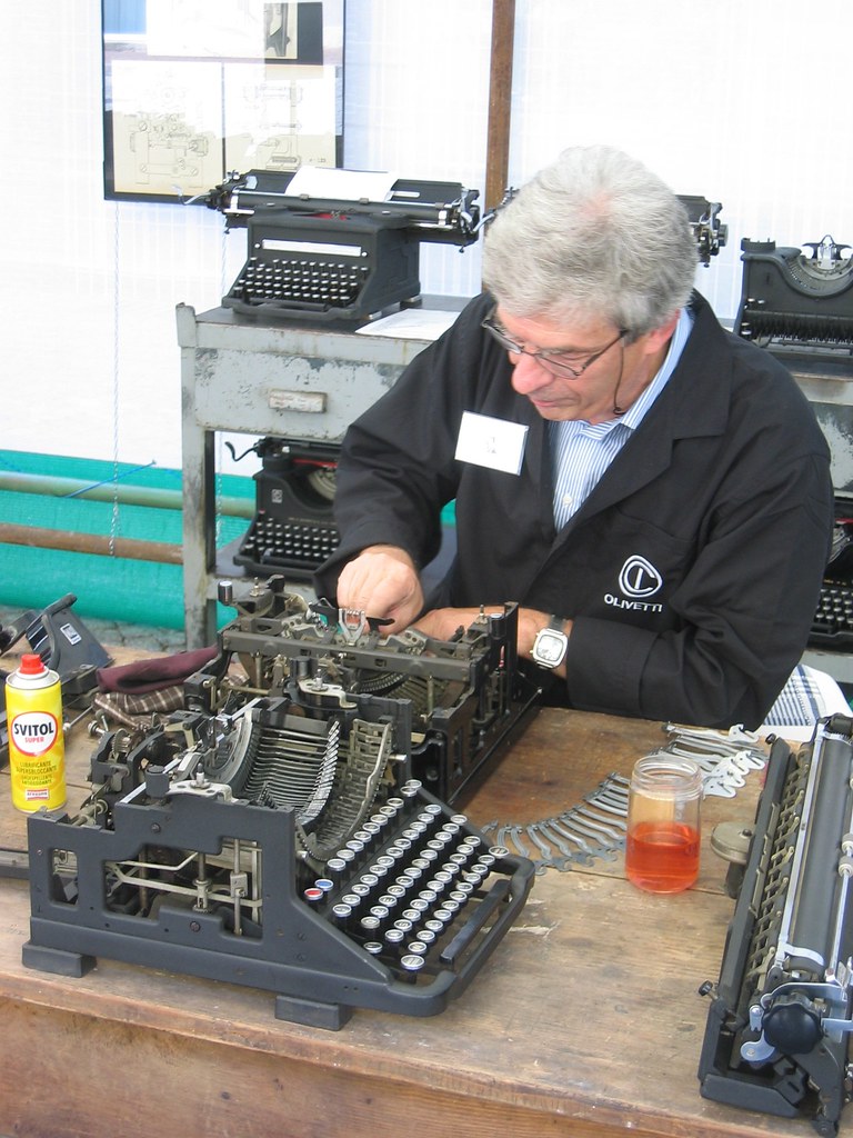 Repairs Repairing a typewriter...I'm not sure if they were… Flickr