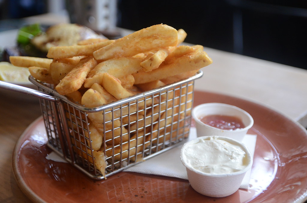 Beerbattered chips with sour cream and sweet chilli sauce AUD11.90 Eating House, Rowville a