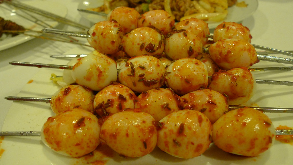 Quail Eggs spicy quail egg skewers H & H Restaurant (Mon… Flickr