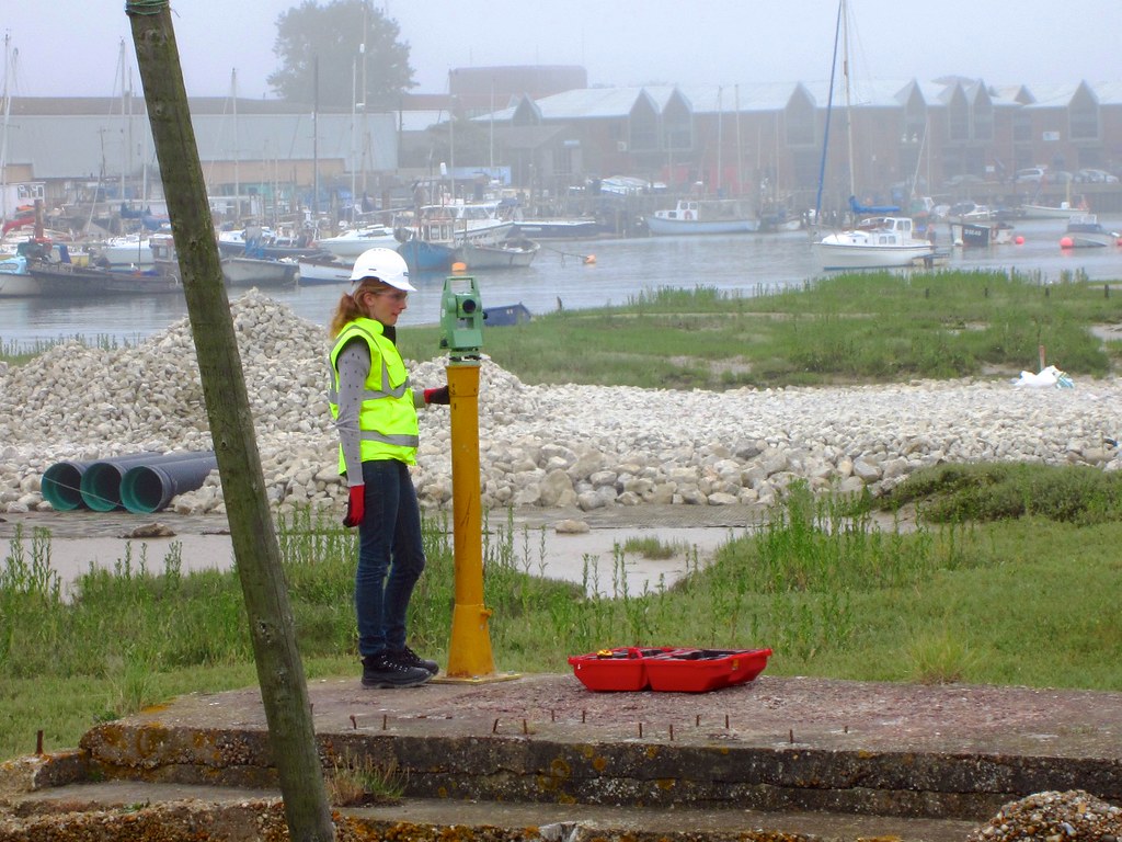Keeping it straight A surveyor at work on the new Shoreham… Flickr