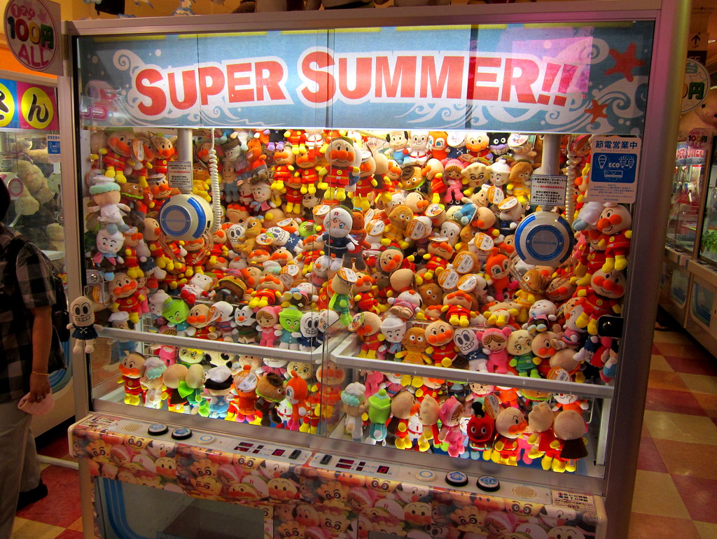 Tokyo Japan Shinjuku area game arcade big claw machine with colorful
