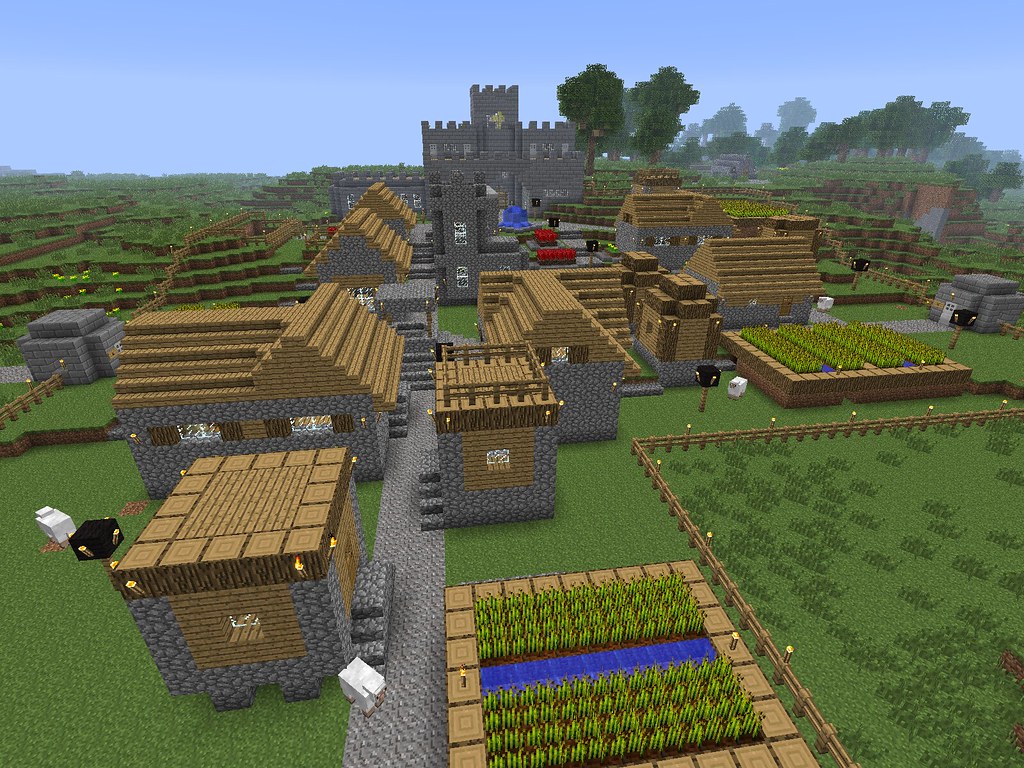 My minecraft village and castle, built while listening to … Flickr
