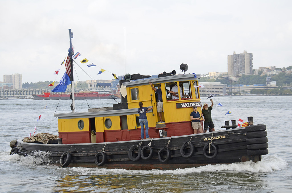Tugboat W.O. Decker As it Passes Pier 84 In The Parade Of