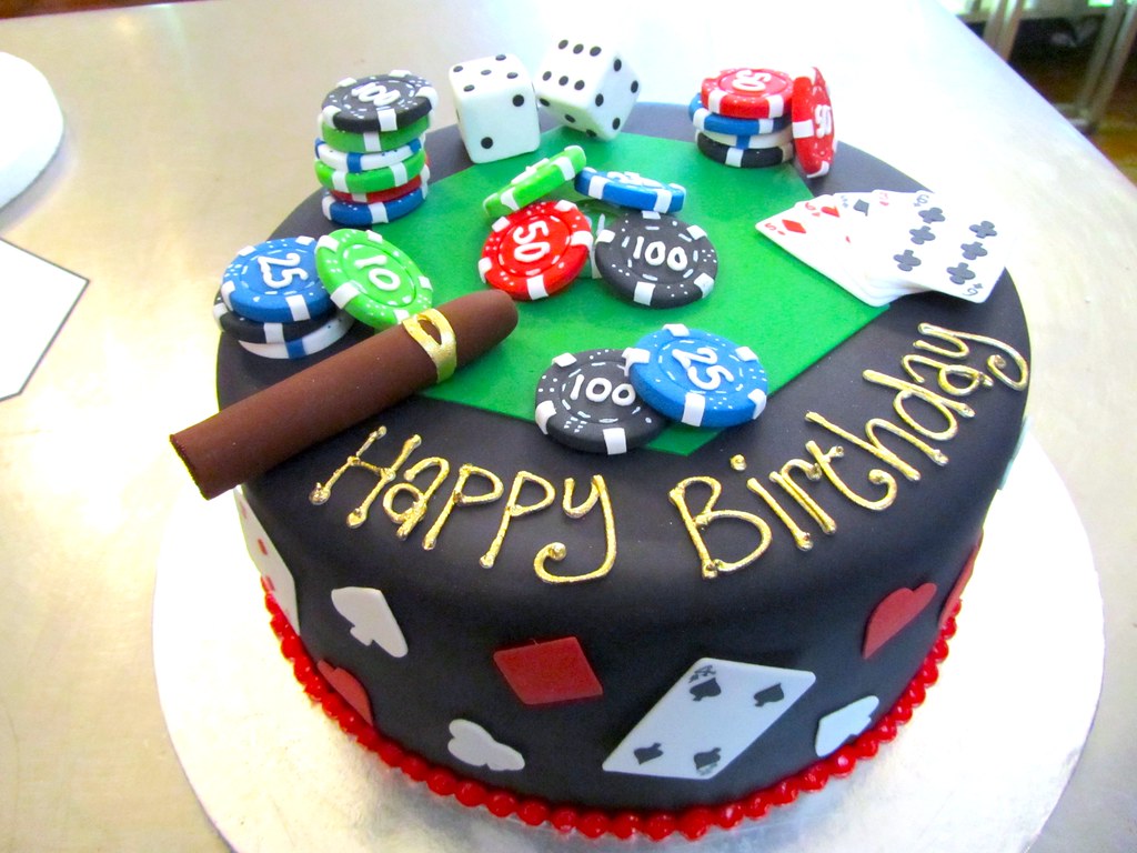 Wicked Chocolate cake covered in black fondant icing, decorated with