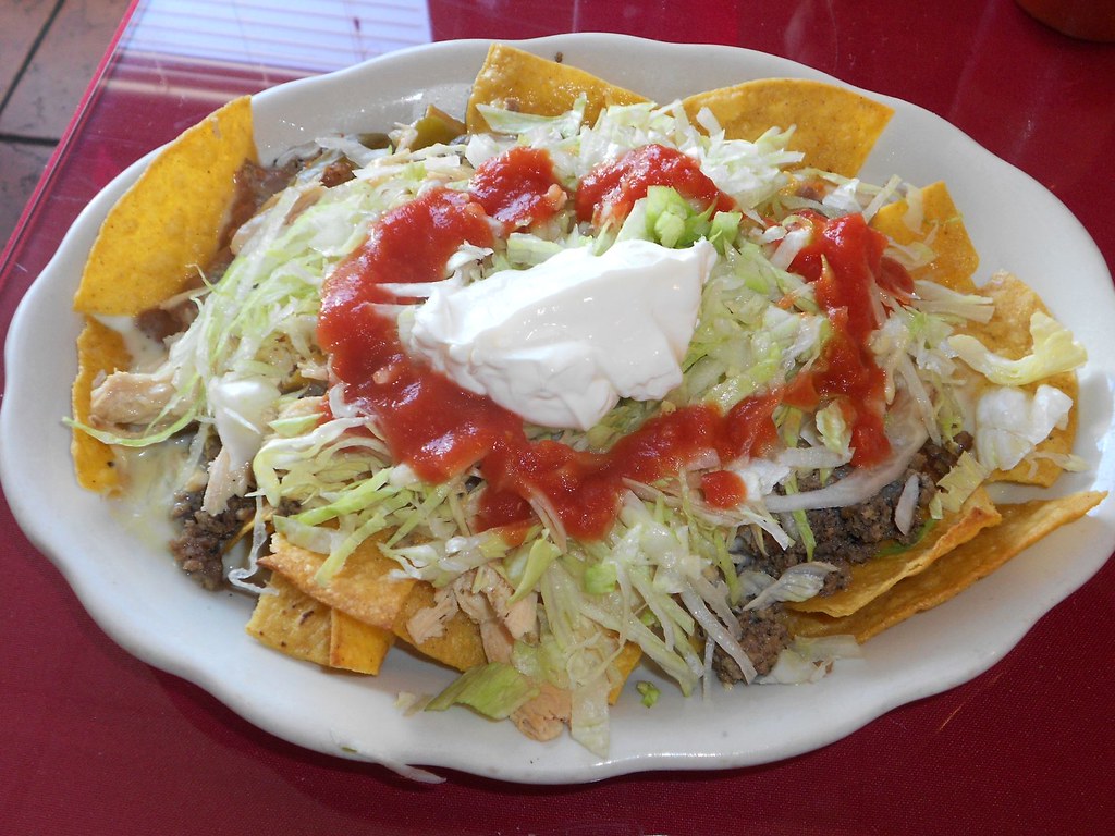 Nachos Azteca A delicious plate, nachos covered with groun… Flickr
