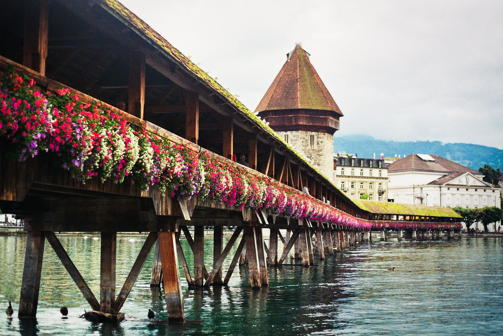 Chapel Bridge, Lucerne The Beautiful flower lined Chapel B… Flickr