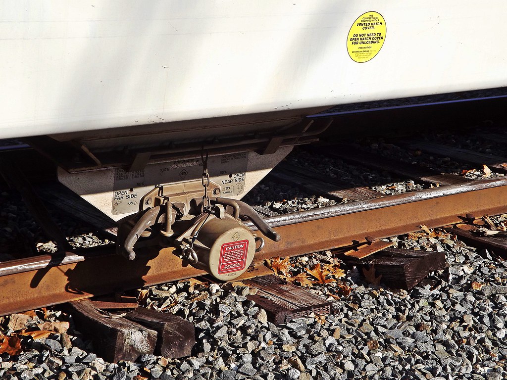 P&W Woonsocket Yard hopper car off the tracks and it is re… Flickr