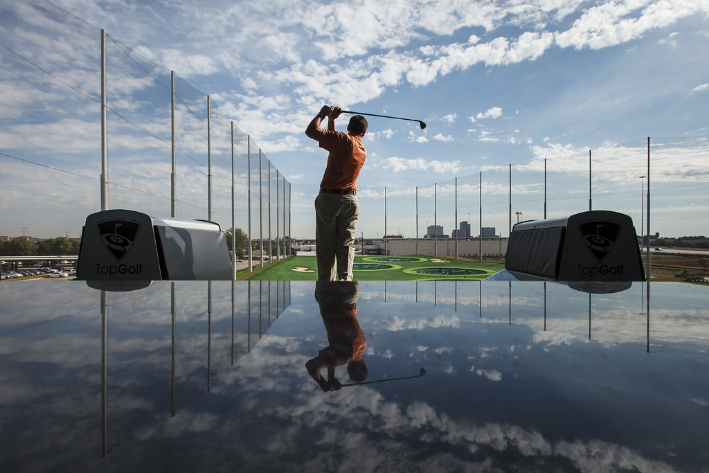 TopGolf Jonathan Buckley hits a golf ball at TopGolf, a 64… Flickr