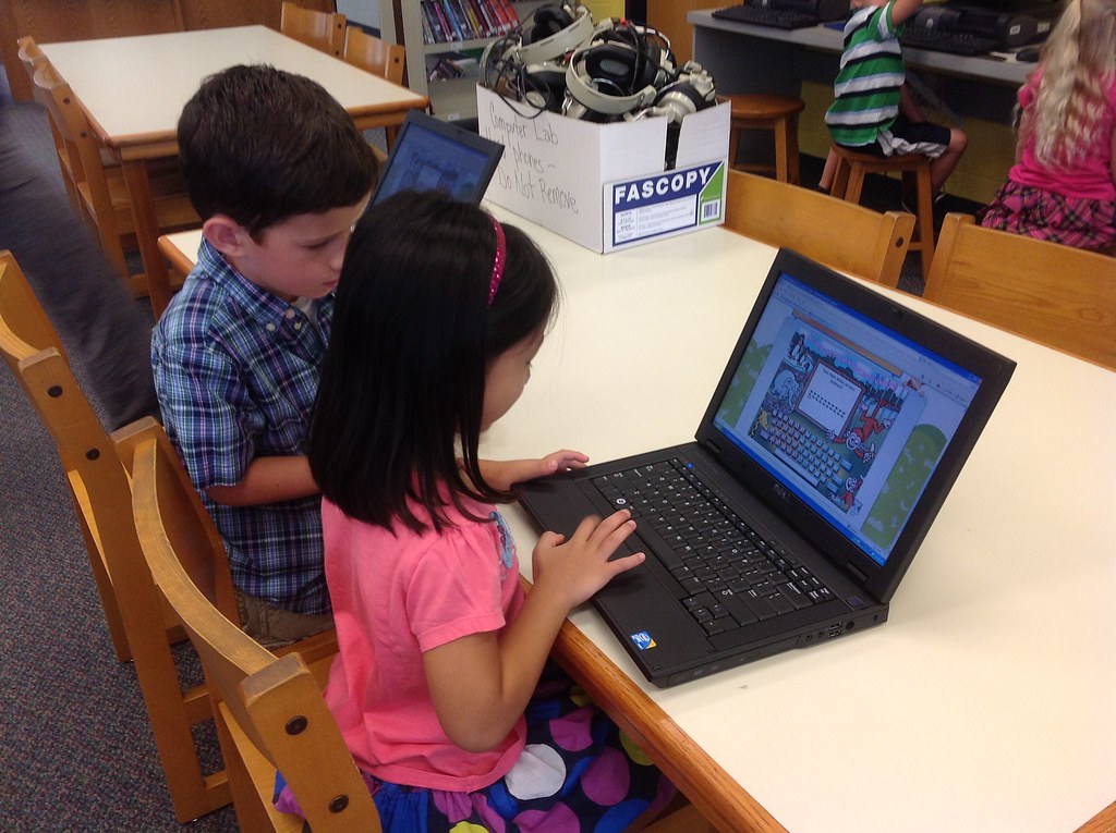 Kindergarten Students typing on the laptops that are house… Flickr