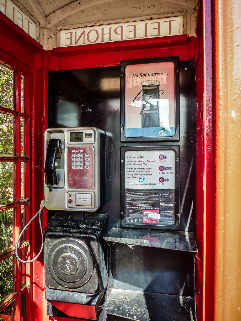 ENOHPELET Inside a red telephone box Chris Parfeniuk Flickr