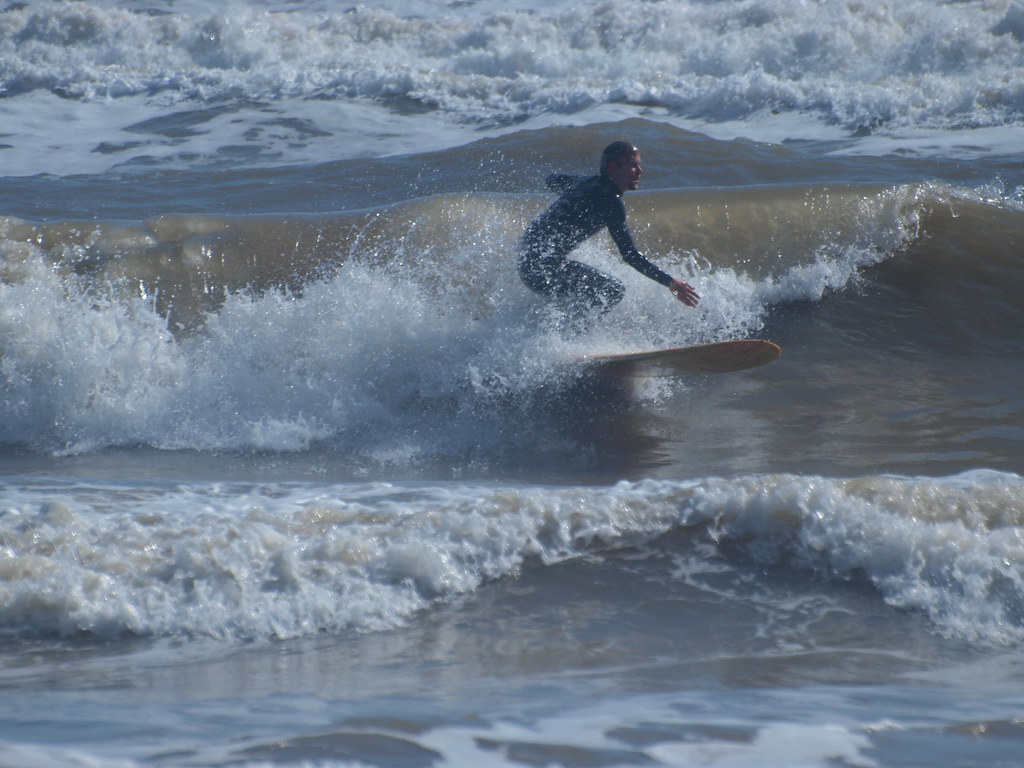 Surfside Beach Texas Surfers Surfing in the cold low waves… Flickr