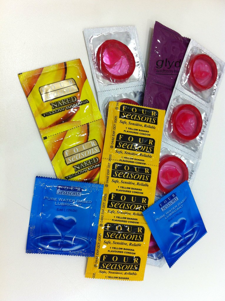 Condoms and lubricants Condom packets and lubricants Flickr