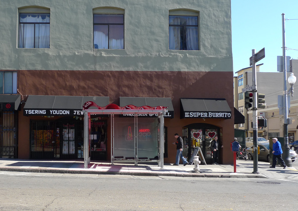 living above the bus stop at el Super Burrito NE corner of… Flickr