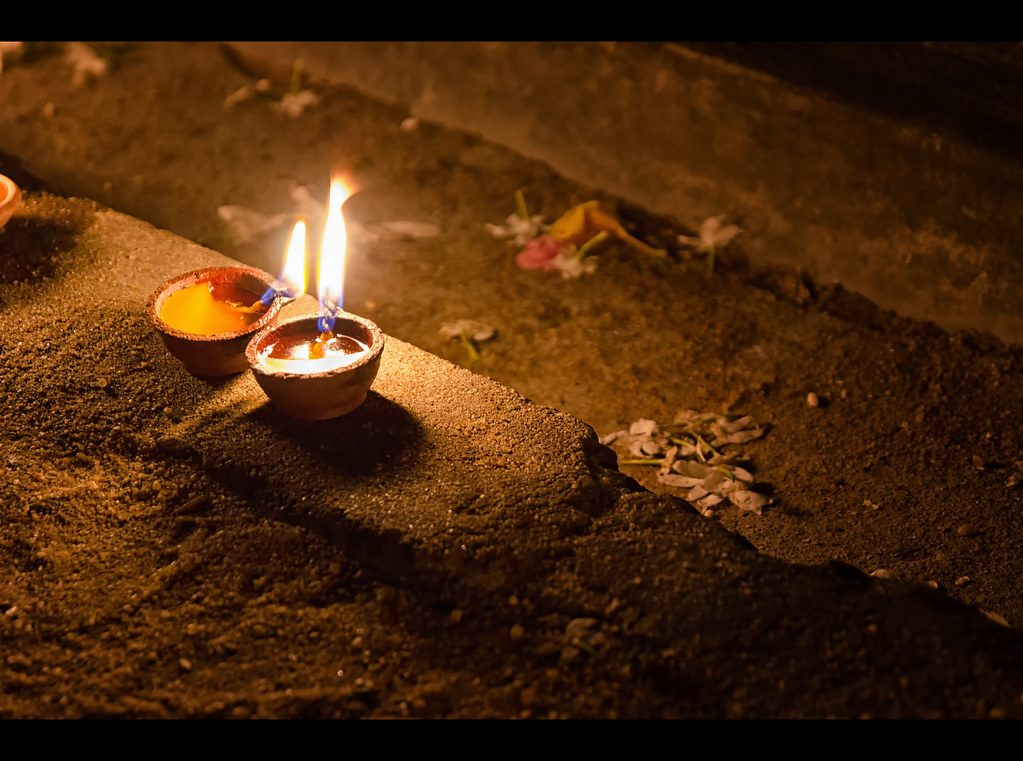 A Candle Burns (Sri Lanka) A candle burns at the Kelaniya … Flickr
