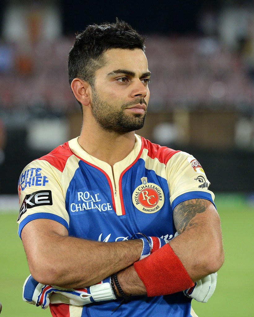 Virat Kohli takes a break during the practice session. | Flickr