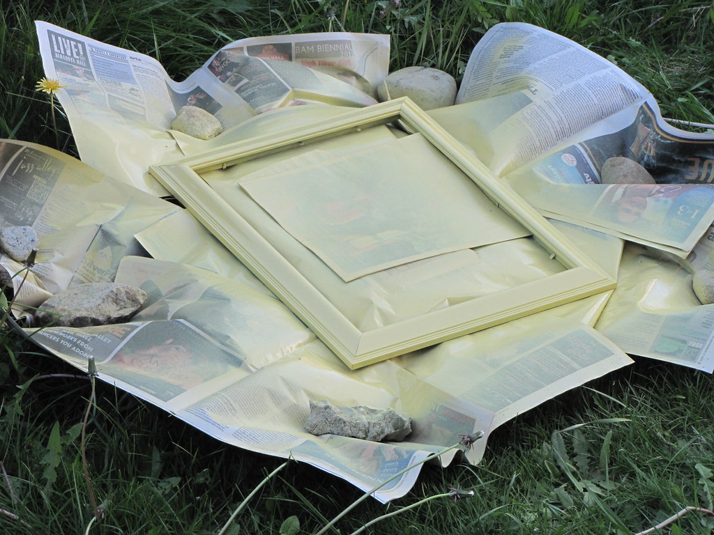 Spray painting Two ugly picture frames needed to be repain… Flickr
