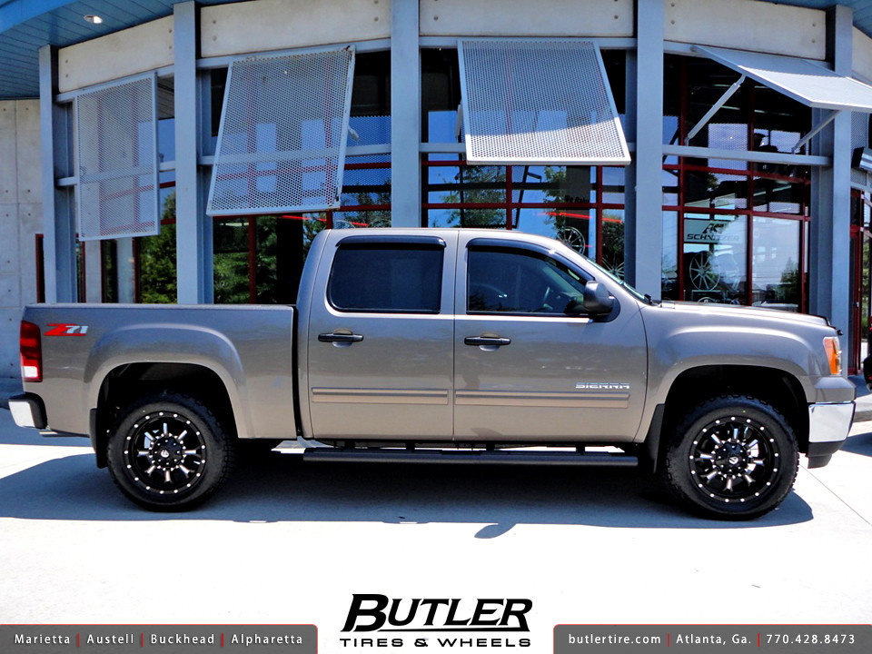 GMC Sierra 1500 with 20in Fuel Krank Wheels and 2in Level Kit a photo