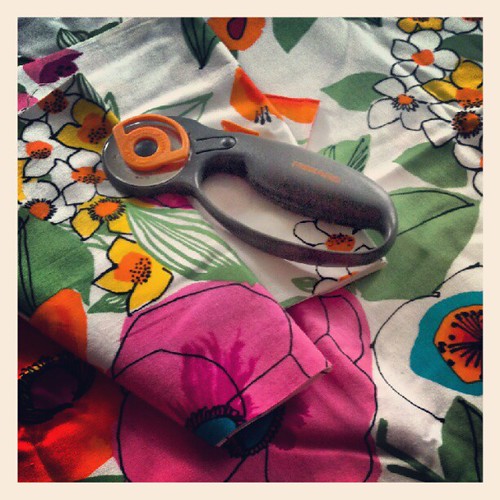 Cutting fabric for pillow cases at Ma's! Sarah Lomba deGrandis Flickr