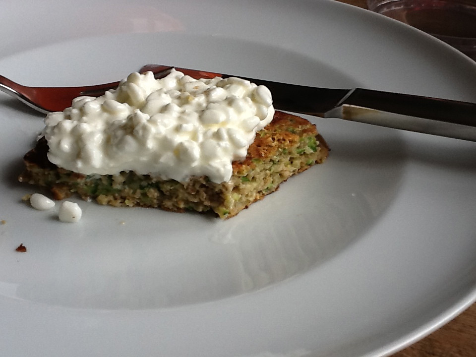 Zucchini bread pancake with cottage cheese on top Dominik W. Neuffer