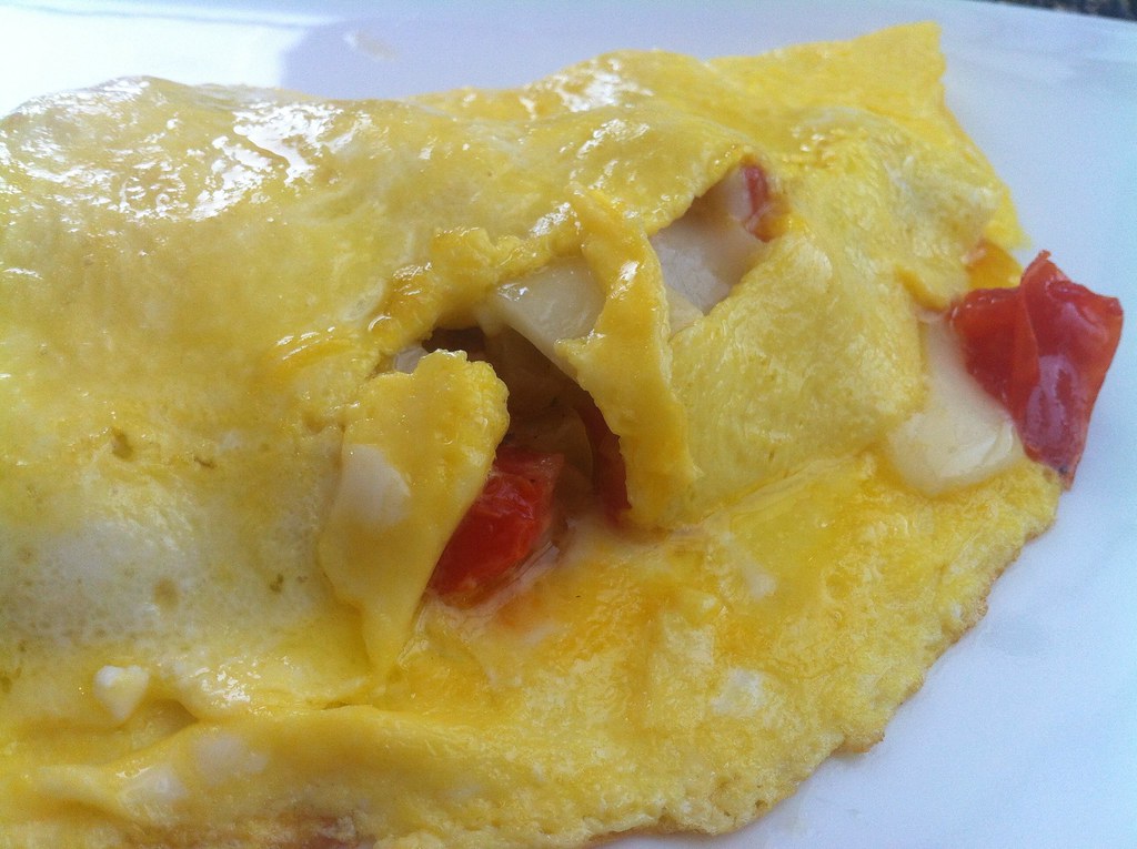 Another day, another omelet Asiago fresco, tomatoes, peppe… Flickr