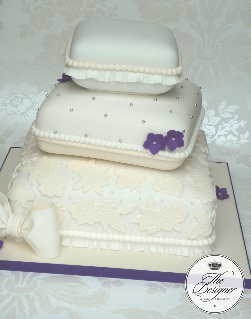 Stacked pillow wedding cake Three tier pillow cake deliver… Flickr