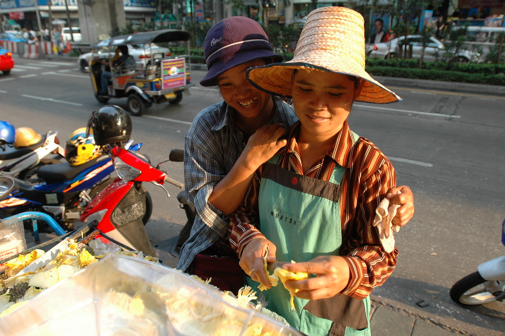 street vendor Two street vendors in Bangkok. © ILO/ Marcel… Flickr