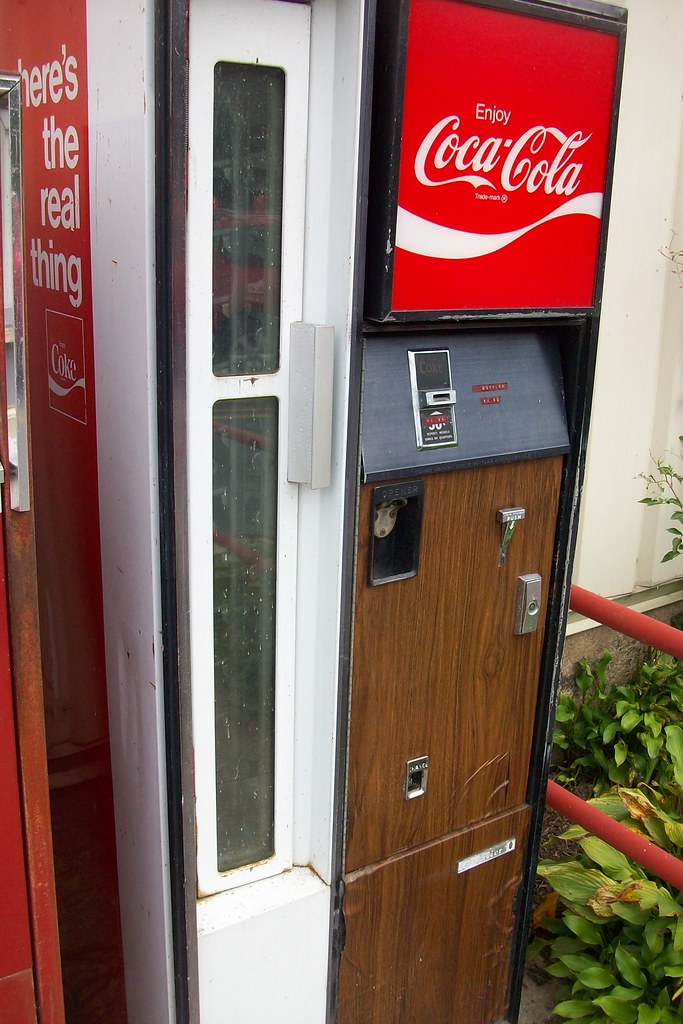 CocaCola vending machine Still in service. Sled Works. Du… Flickr