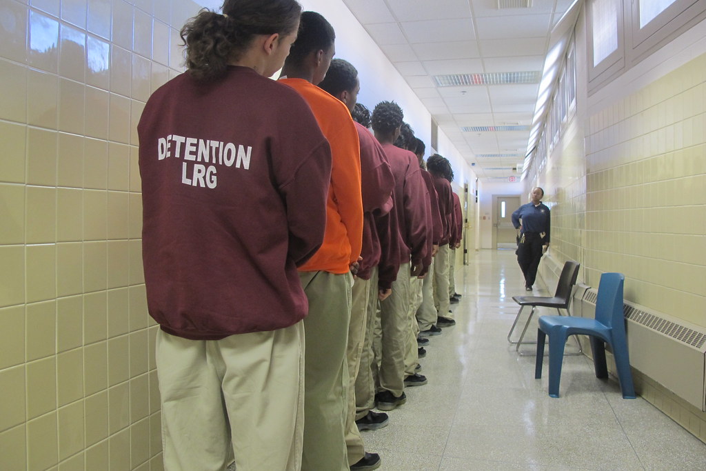 38 Juveniles line up in the hallway outside of a classroom… Flickr