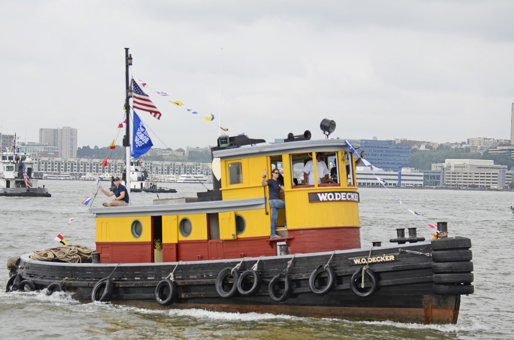 Tugboat Waits For The Parade Of Tugs To Start In Front Of