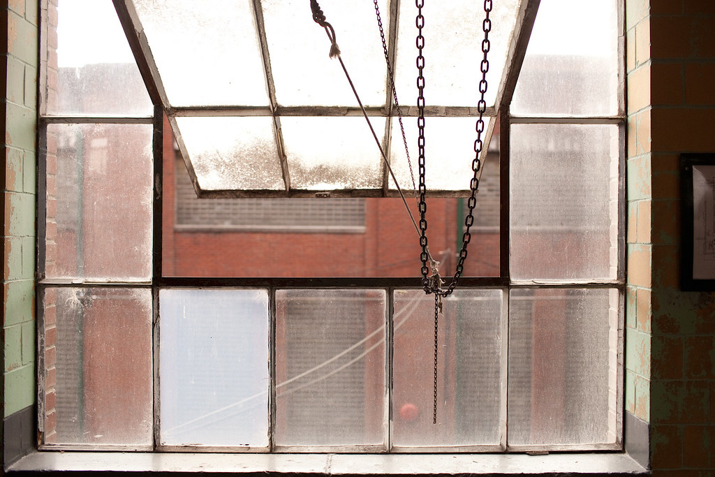 Windows and Chains Taken through a catwalk window on the H… Flickr