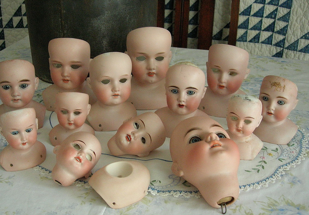 Bisque doll heads were inside the canister! I have just go… Flickr