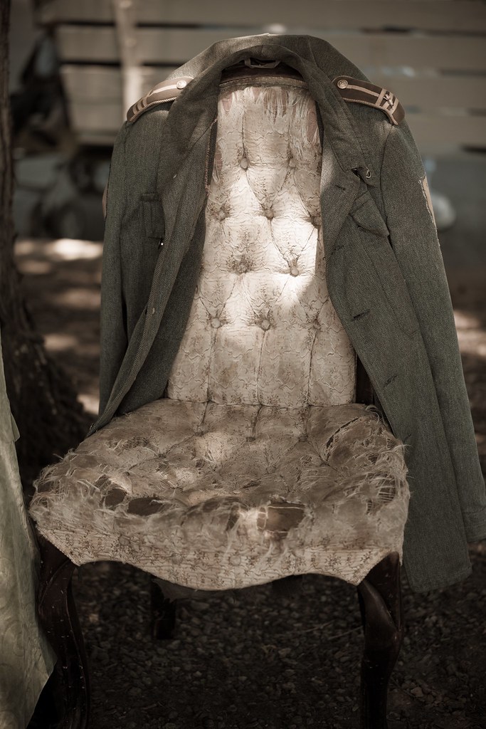 Worn chair draped with steampunk jacket Worn chair draped … Flickr