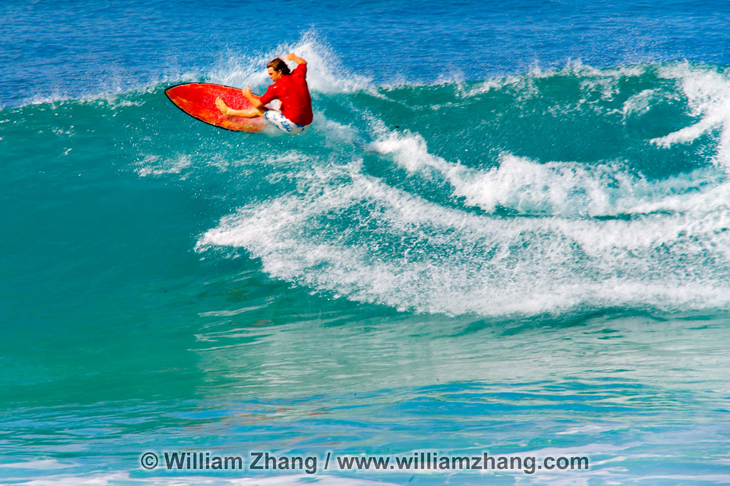 Climbing the face of a wave at Ehukai Beach Park on North … Flickr