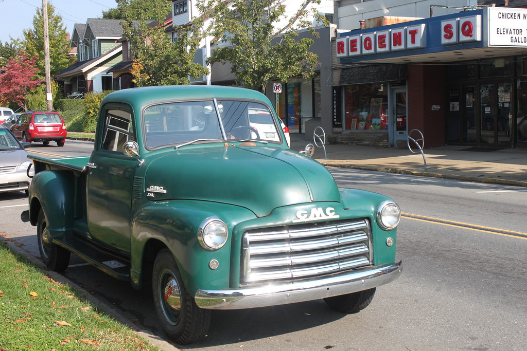 GMC Classic GMC pickup parked in front of the Regent Squar… Flickr