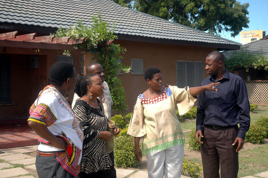 Ambrose Nshala SOS Village Being shown around by the Moth… Flickr