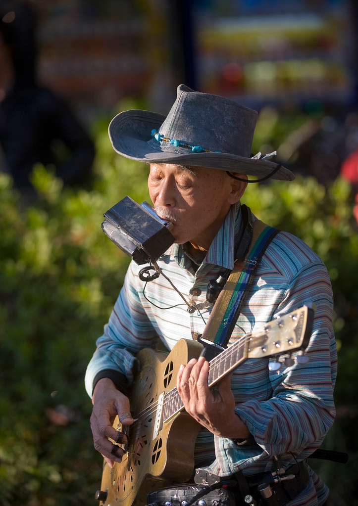 Street Performer Playing Multiple Instruments Copyright © … Flickr
