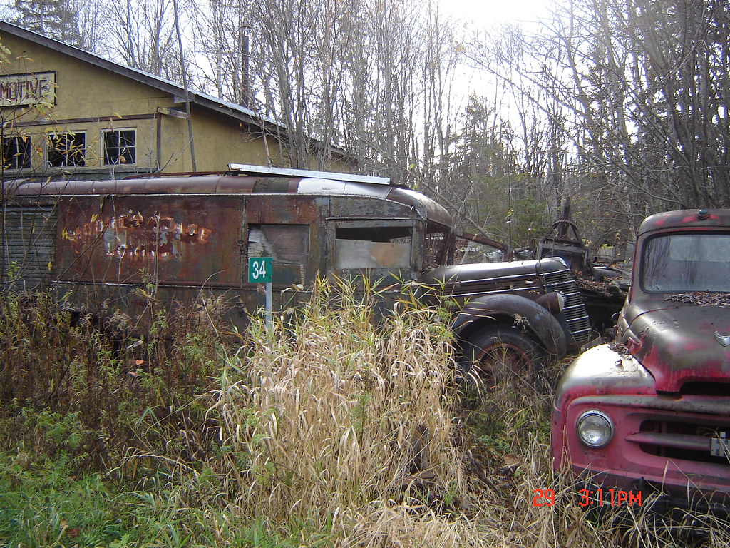 Port Loring, Ontario. Truck wrecking yard with vintage 194… Flickr
