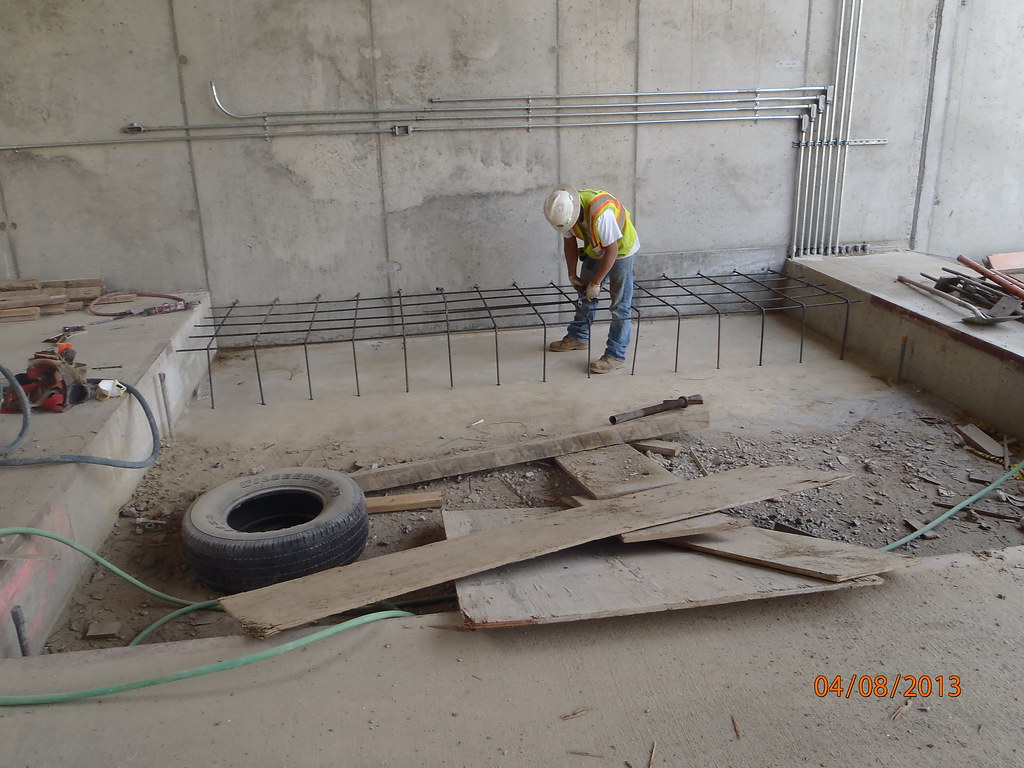 P4081952 Placing rebar for side walk southeast corner of i… Flickr