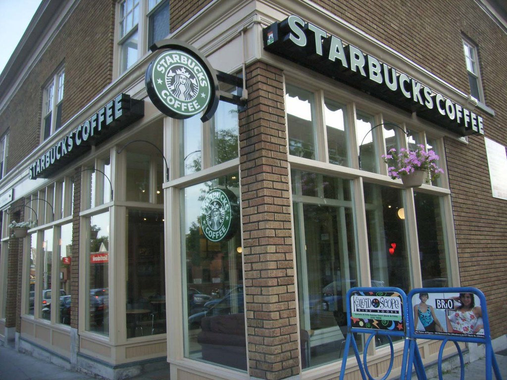 The Starbucks Coffee shop at the corner of Bank and Hopewell. a photo