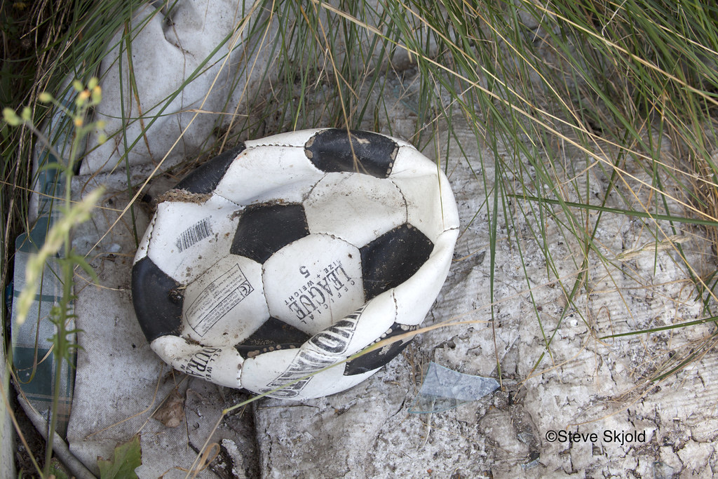 Abandoned Soccer Ball Discarded deflated soccer ball. Zawa… Flickr