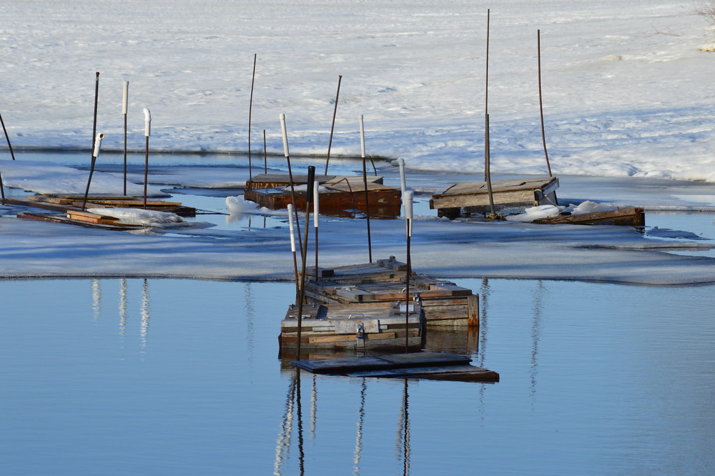 Ice Fishing These are small (2 ft. square) wooden floating… Flickr