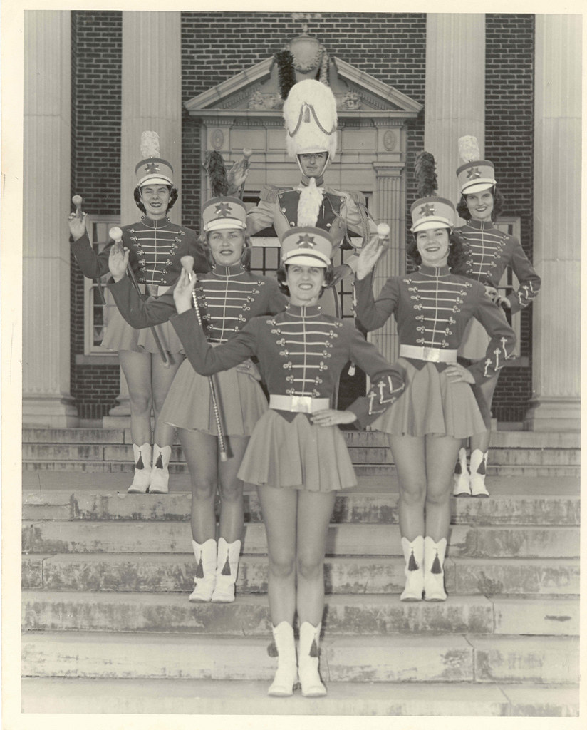 1950 Drum major and majorettes on steps of Old Main, Arkan… Flickr