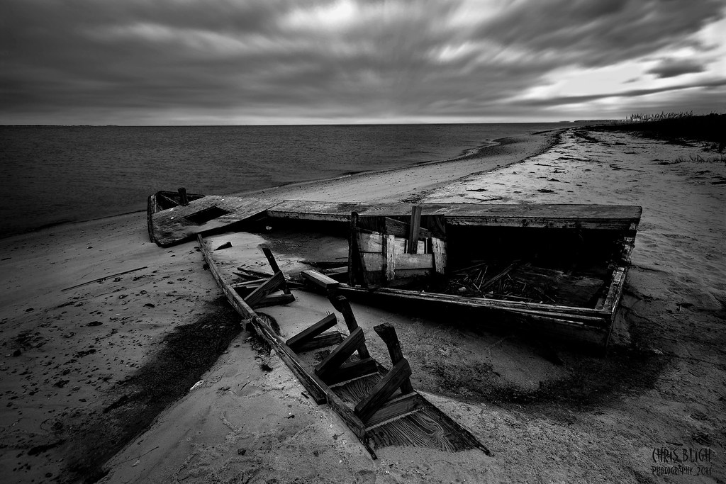 Marooned A wrecked oyster boat, slowly being consumed by t… Flickr