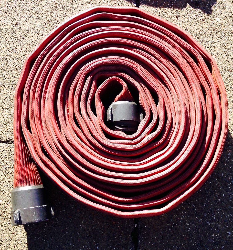 Rolled fire hose straight roll Fire Trucks 4 Hire Flickr
