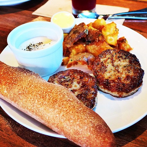 Big brekkie of poached eggs, homemade spicy sausage, potat… Flickr