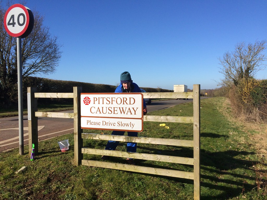 Cleaning the Brixworth Rd signs David Walker Flickr