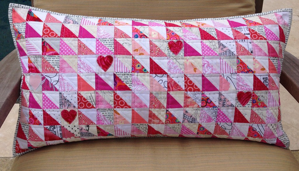 Valentine pillow Made with leftover grand illusion hst's