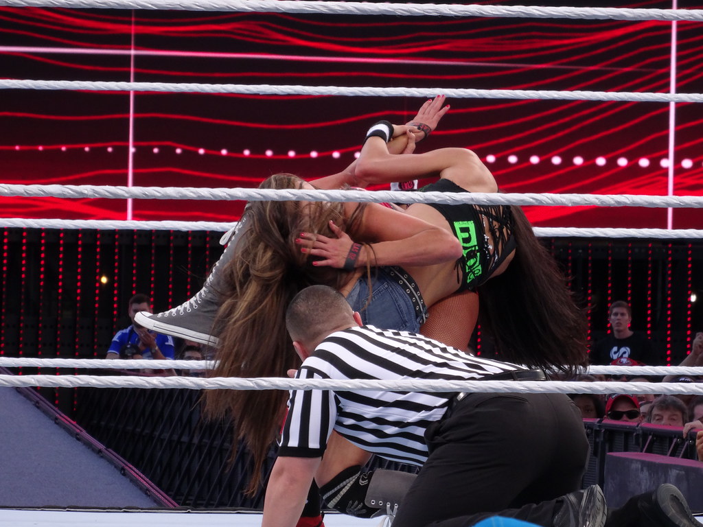 WWE Diva AJ Lee applies finisher submission hold the Black… Flickr